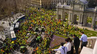 People look down at a protest in Madrid, Spain as hundreds of farmers drove their tractors into the capital as part of ongoing protests against European Union and local farming policies (Manu Fernande