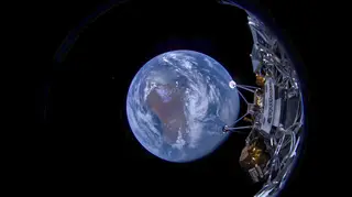 Image provided by Intuitive Machines shows its Odysseus lunar lander with the Earth in the background