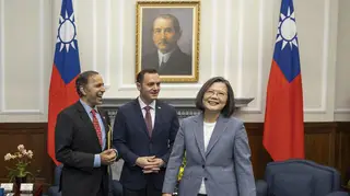 Taiwanese President Tsai Ing-wen (right) meets representatives Mike Gallagher (centre) and Raja Krishnamoorthi (left)