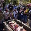 People mourn the death of miner Santiago Mora