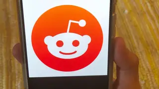 Reddit logo on a mobile phone