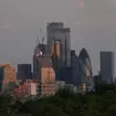 The skyline of the City of London during sunrise