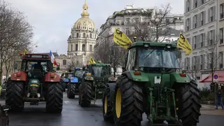 Farmers drive their tractors in Paris