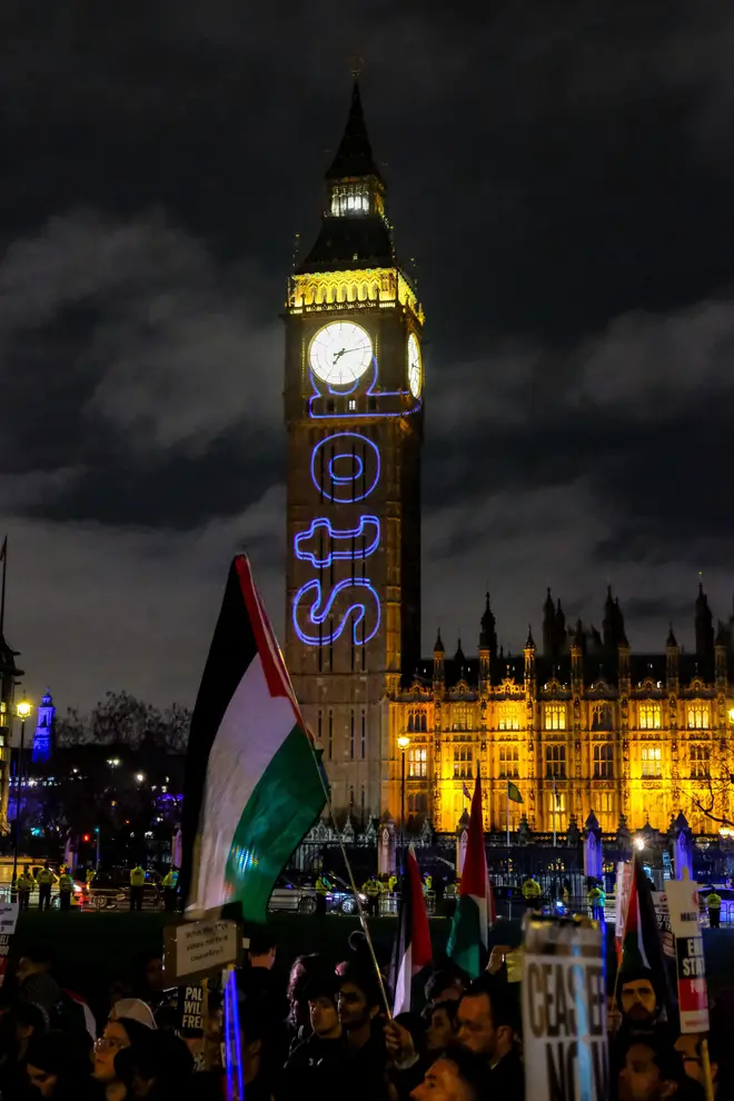 London, UK, 21st February, 2024. Protesters gather for a rally on Parliament Square