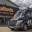 A Halfords store and Mobile Expert van