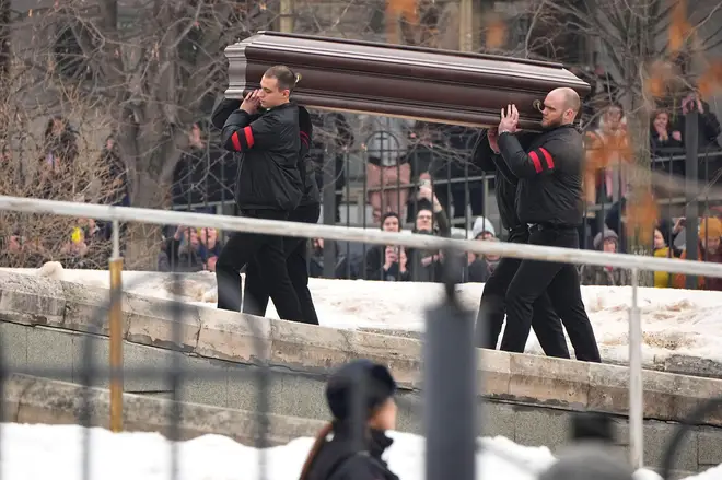 Pallbearers carried the coffin of the Russian opposition leader into the church