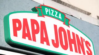 Papa John’s logo above a pizza takeaway in Wokingham, Berkshire, UK