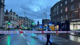 There has been a suspected shooting involving two men in Clapham, according to reports.