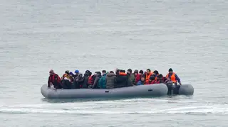 Migrants crossing the Channel in a dinghy (file photo)
