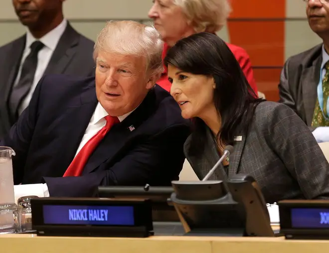 Donald Trump speaks with then-U.S. Ambassador to the United Nations Nikki Haley during the United Nations General Assembly, September 18, 2017