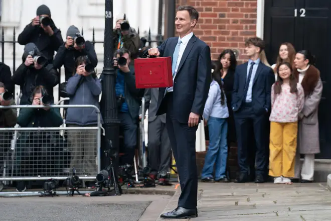 Chancellor of the Exchequer Jeremy Hunt leaves 11 Downing Street, London, with his ministerial box before delivering his Budget, Wednesday