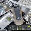 A pile of old cell phones to be recycled