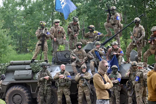 Fighters of the Russian Volunteer Corps (RDK) are pictured during a briefing near the border in northern Ukraine