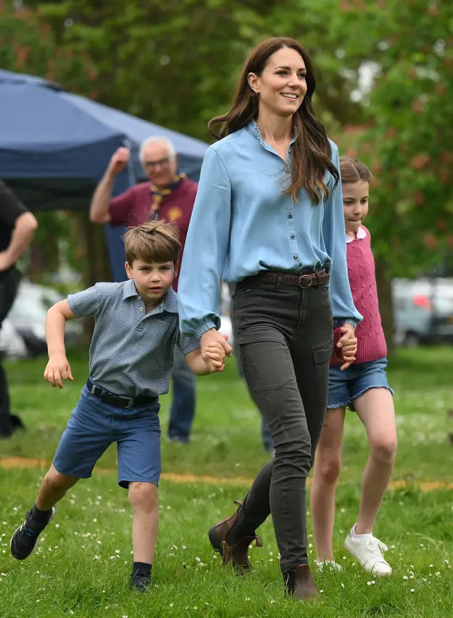 Prince Louis, the Princess of Wales and Princess Charlotte on a visit to the Scouts last May