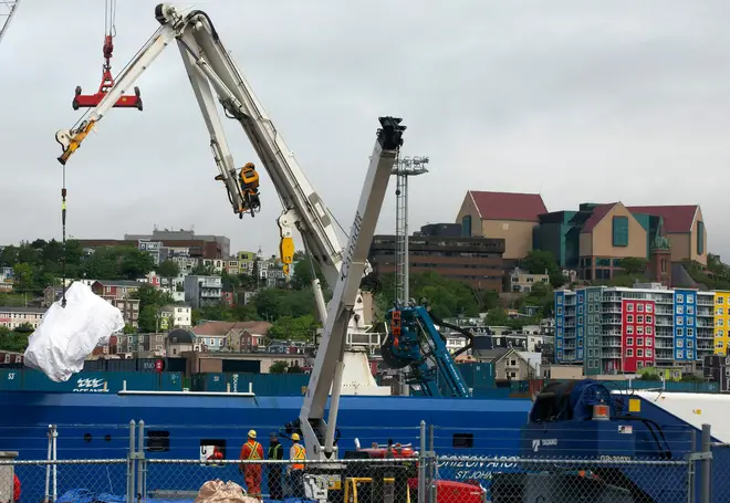 Debris from the Titan submersible, recovered from the ocean floor near the wreck of the Titanic, is unloaded from the ship Horizon Arctic at the Canadian Coast Guard pier in St. John's, Newfoundland, June 28, 2023