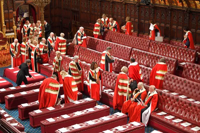 Members of the House of Lords arrive to sit in their seats in the Chamber East Gallery