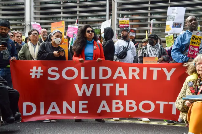 Protesters show solidarity with Diane Abbott outside the Home Office during the march against racism, Islamophobia and antisemitism.