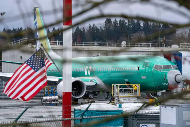 Boeing airplanes stand in various stages of maintenance outside the Boeing Renton Factory in Renton, Washington, USA