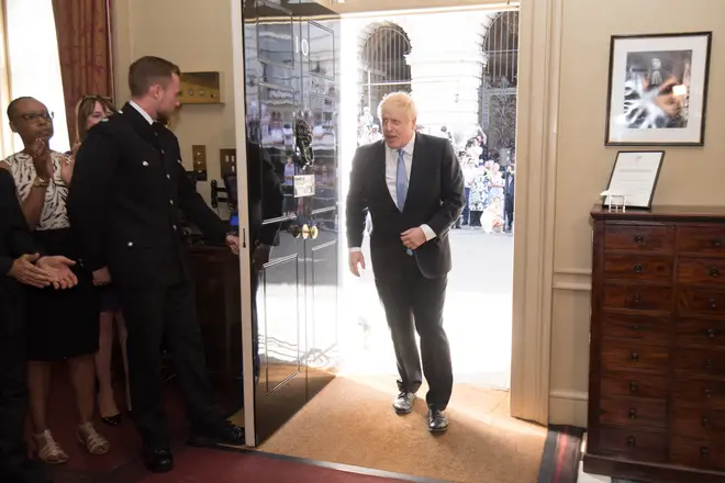 Boris Johnson enters Downing Street