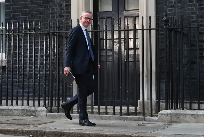 Michael Gove entering Downing Street