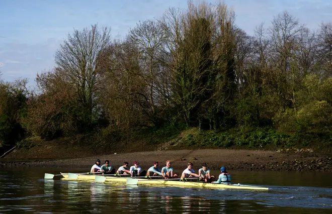 The Cambridge men's team during a training session on the River Thames