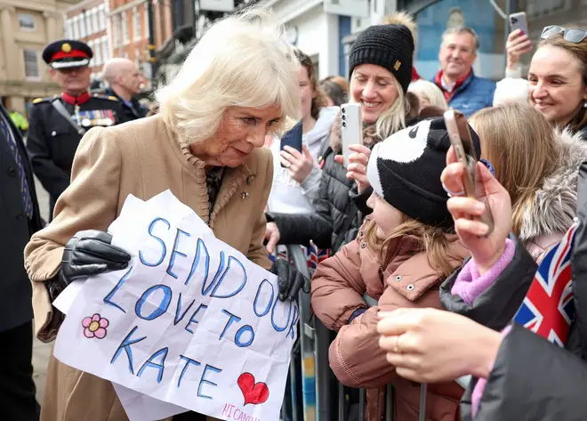 Camilla meets young fans as she toured a market in Shrewsbury