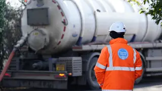 A Thames Water employee with a tanker