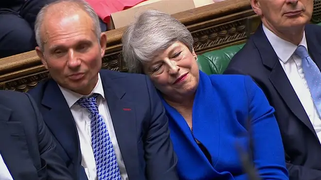 Prime Minister Theresa May leans on the Minister for the Cabinet Office David Lidington during her last Prime Minister's Questions in the House of Commons, London.