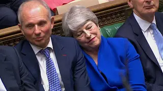 Prime Minister Theresa May leans on the Minister for the Cabinet Office David Lidington during her last Prime Minister's Questions in the House of Commons, London.