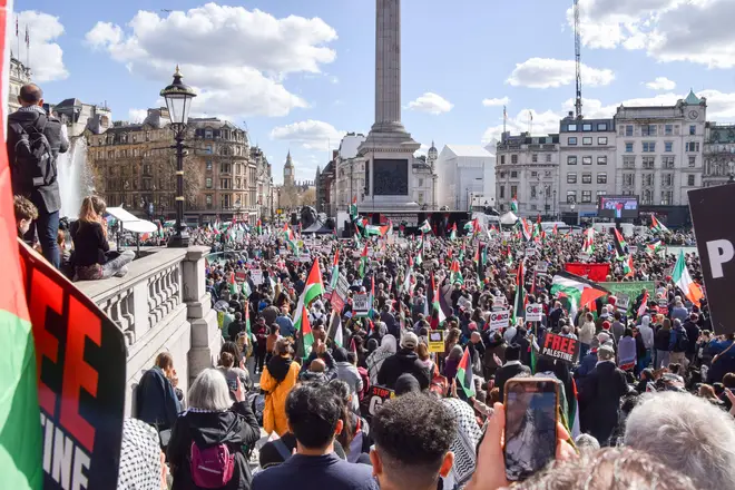 Protesters gather for a rally in Trafalgar Square. Tens of thousands of people marched in solidarity with Palestine in Central London, calling for a ceasefire as the Israel-Hamas war continues. Credit: Vuk Valcic/Alamy Live News