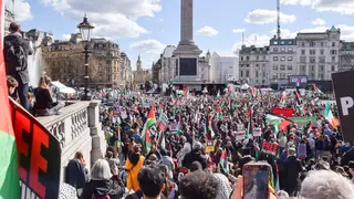 Protesters gather for a rally in Trafalgar Square. Tens of thousands of people marched in solidarity with Palestine in Central London, calling for a ceasefire as the Israel-Hamas war continues. Credit: Vuk Valcic/Alamy Live News
