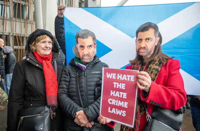 Campaigners gather outside the Scottish Parliament at Holyrood in Edinburgh, to mark the introduction of the Hate Crime and Public Order (Scotland) Act