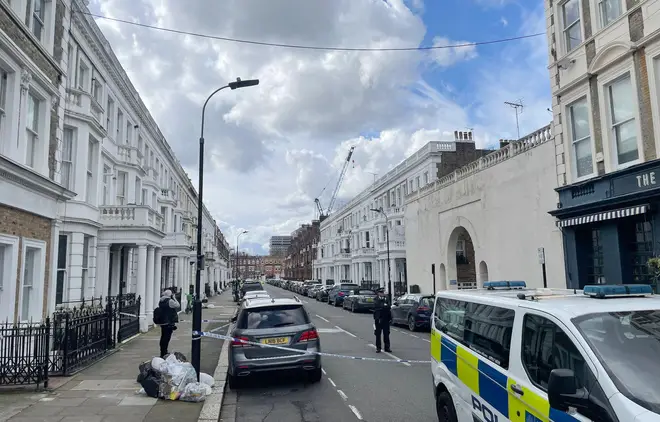 Police at the scene of the shooting in Comeragh Road, West Kensington