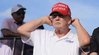 Republican presidential candidate former President Donald Trump watches play during the final round of LIV Golf Miami, at Trump National Doral Golf Club