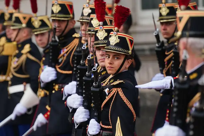 France's Gendarmerie's Garde Republicaine arrive at Buckingham Palace, London, during the Changing of the Guard ceremony
