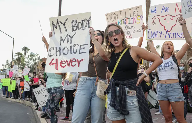 Abortion rights protesters chant during a Pro Choice rally in Tucson, Arizona