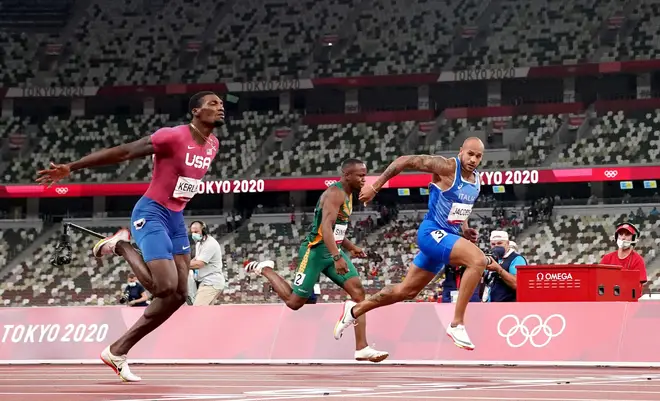 Italy's Lamont Jacobs (right) wins the Men's 100 metres at the Olympic Stadium on the ninth day of the Tokyo 2020 Olympic Games in Japan.