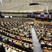 Members of the European Parliament participate in a series of votes as they attend a plenary session at the European Parliament in Brussels