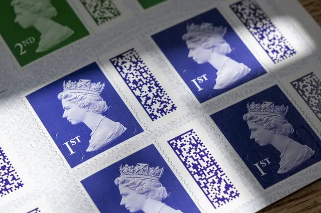 Books of barcoded Royal Mail 1st class postage stamps depicting the head of Queen Elizabeth II