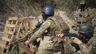 Members of the Siberian Battalion, formed mostly of volunteer Russian citizens, of the Ukrainian Armed Forces’ International Legion, practice during military exercises