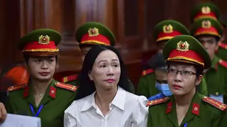 Truong My Lan, front centre, attends a trial in Ho Chi Minh City, Vietnam
