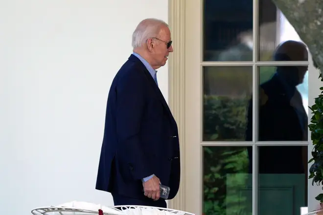 President Joe Biden walks to the Oval Office of the White House in Washington