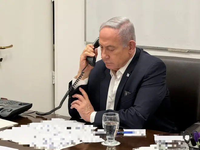 Israeli Prime Minister Benjamin Netanyahu making a phone call with U.S. President Joe Biden.