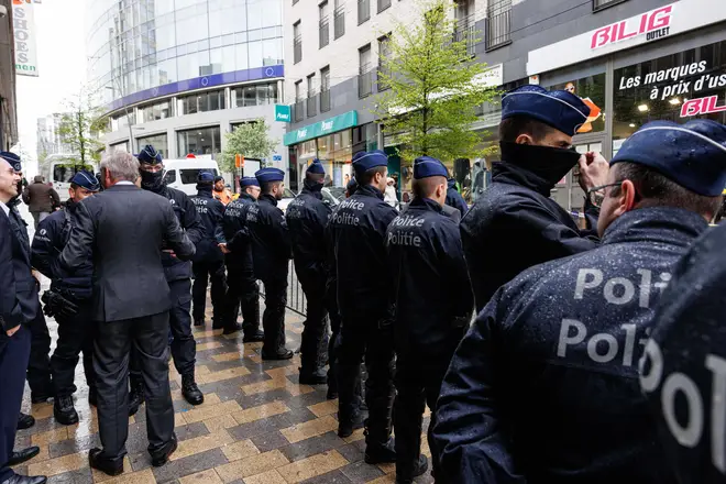 Police block the entrance of the Claridge hotel in Brussesl where is held the "NatCon" national conservatism conference