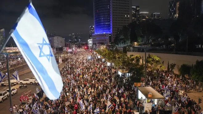 People protest against Israeli Prime Minister Benjamin Netanyahu’s government and call for the release of hostages held in the Gaza Strip by the Hamas militant group in Tel Aviv, Israel