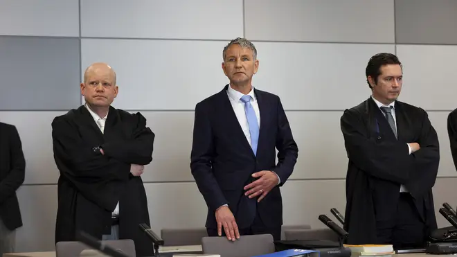 German far-right politician of the Alternative for Germany (AfD) Bjorn Hocke, centre, attends his trial in the state court in Halle, Germany
