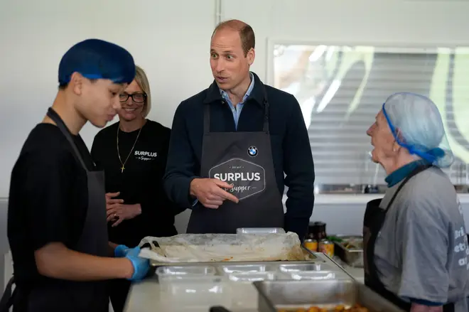 Prince William helped with food preparation during the charity visit.