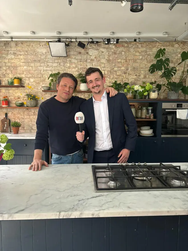 Jamie Oliver with LBC reporter Henry Riley. 