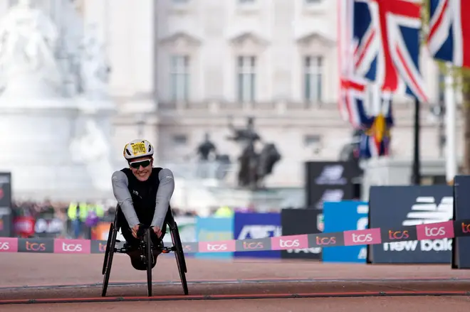 Catherine Debrunner of Switzerland crosses the finish line to win the women's wheelchair race at the London Marathon