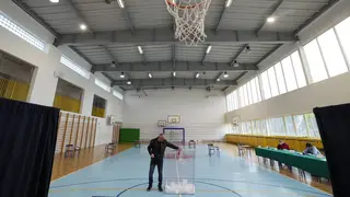 Polish voters take part in a local run-off election in Lomianki, near Warsaw